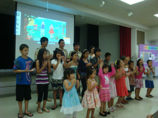 Children perform for Mrs. Saito