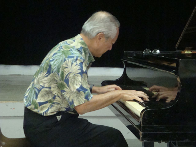 Francis Okano at the piano