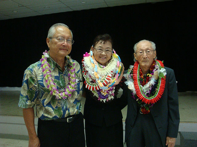 Mrs. Saito with Rev. Saito and Francis Okano