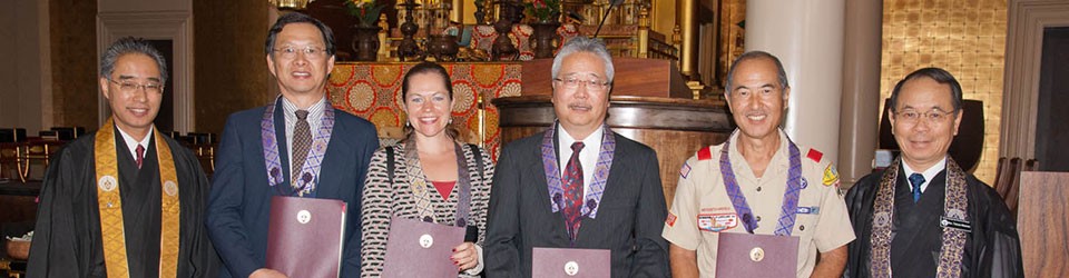 ministers' lay assistants hold their certificates, with Bishop Matsumoto and Rimban Muneto