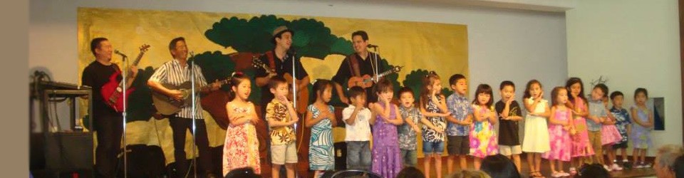 children and Manoa DNA on stage