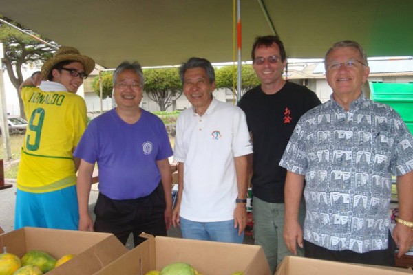 board members at the produce booth