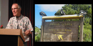 Jim Waddington at podium with image of Laysan Island sign