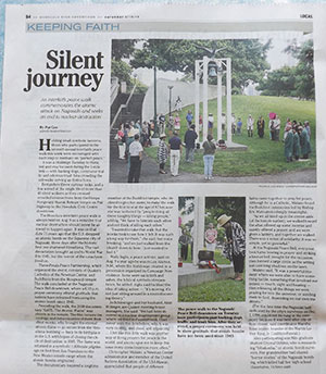 small photo of half-page article on the August 9, 2016 peace walk