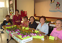 women with flower favors