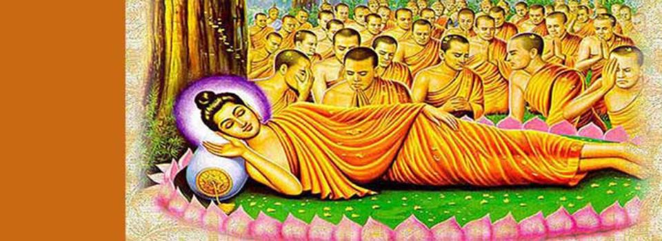 Buddha lying on side attended by many disciples in background