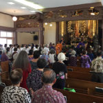Bishops exit the altar area at Soto Mission; Bishop Matsumoto in orange robes