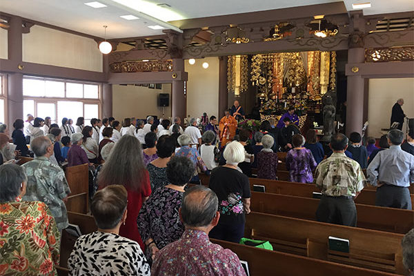 Bishops exit the altar area at Soto Mission; Bishop Matsumoto in orange robes
