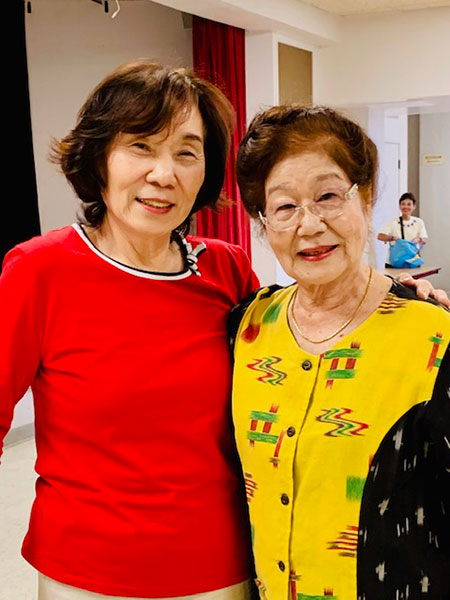 Mrs. Hagio with Mrs. Kida at the sumie/flower arranging exhibition