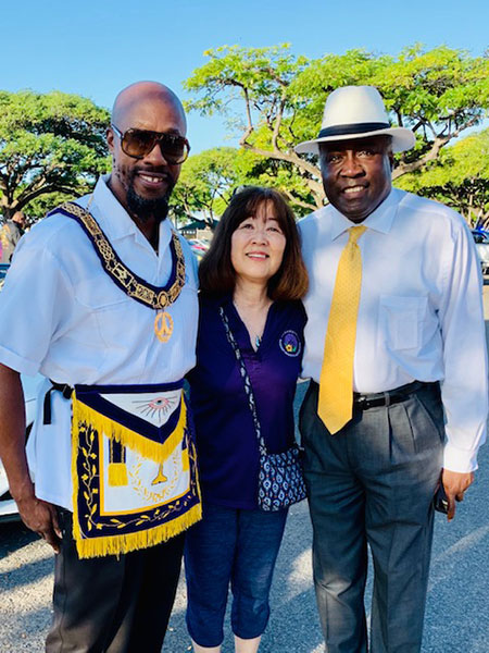 Wendie Yumori with Alphonso Braggs (at right) before the 2019 MLK Parade
