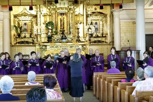 Hawaii Betsuin Choir sings "Flying Free" - in purple gowns before the altar with Choir Director Mari Murakami directing