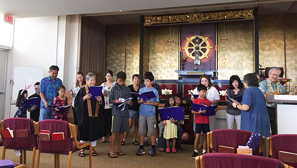 Dharma School choir rehearses after Earth Day Service