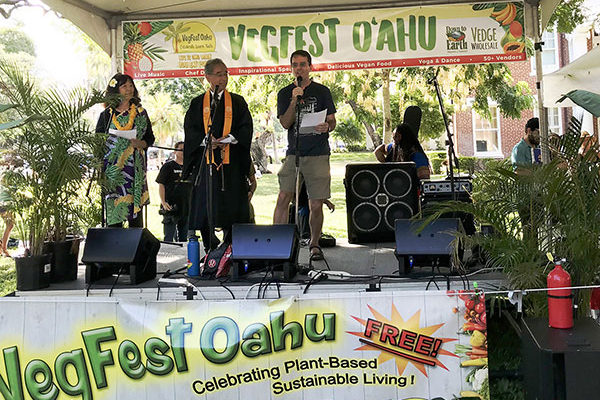 Wendie, Bishop, and Dave from Hongwanji on the VegFest Oahu 2019 stage