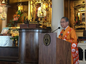 Bishop Eric Matsumoto introduces Manulani Aluli Meyer at HBC Bodhi Day Service 2019 at Hawaii Betsuin