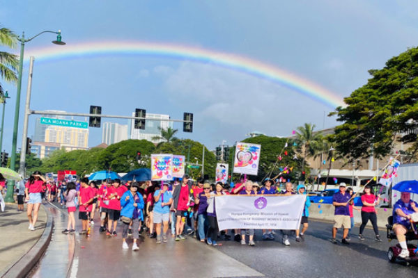 MLK 2020 - Hongwanji group crossing the Ala Wai under a rainbow