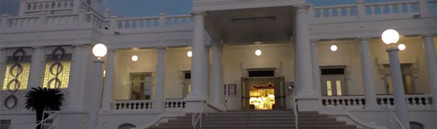 still from New Year's Eve video 2021 - Betsuin as darkness falls, glowing light through the temple doors