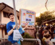 boy holding shave ice sign (Bon Dance ’25, Fri.)