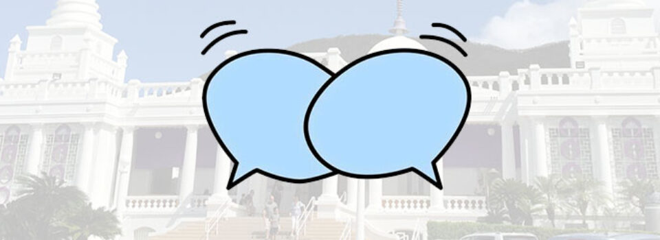 speech bubbles over a faded Betsuin building background